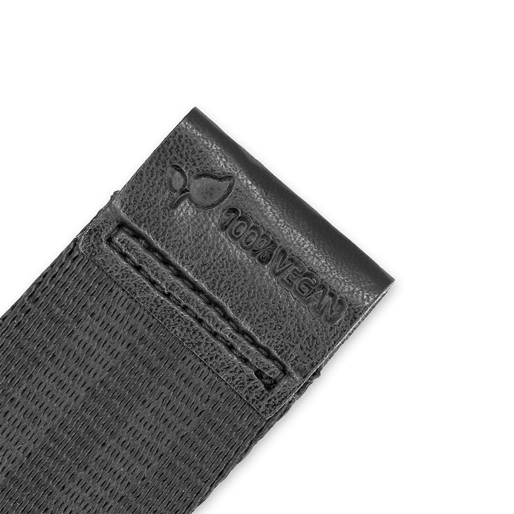 Black vegan leather wallet with 'Vegan' text on a white background